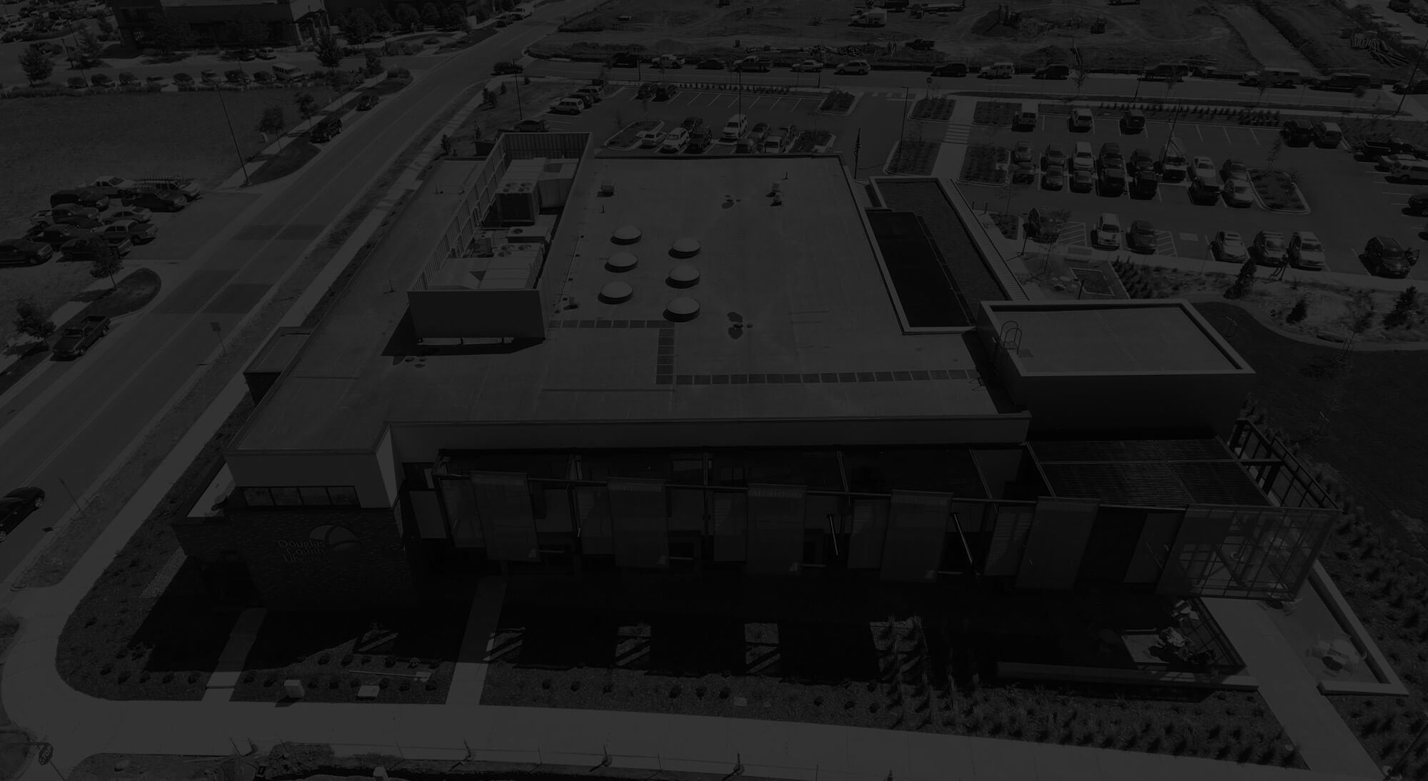 building with a flat roofing solution for our roofing contractors in colorado